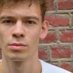 man in white crew neck shirt