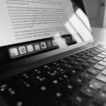 Person typing on laptop computer - start a successful blog